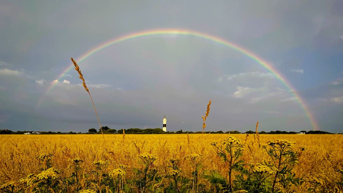 Regenbogen über Leuchtturm Kampen Sylt
